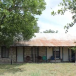 2401 CR 271.South Elevation of Porch.July 22nd.Mak