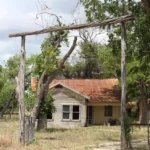 2404 CR 271.Gate and Front Facade.July 22nd.Mak