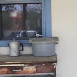 650 CR 271.Back Porch Window and Pots.July 17th.Mak