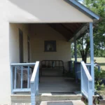 650 CR 271.Front Porch from Side Facade.July 17th.Mak