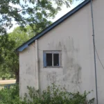 650 CR 271.Side Facade Closed-In Porch.July 17th.Mak