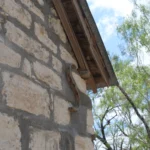 990 CR 271.Side Facade (1) and Eave S.July 17th.Mak